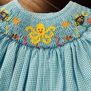 New embroidered smocked dress
